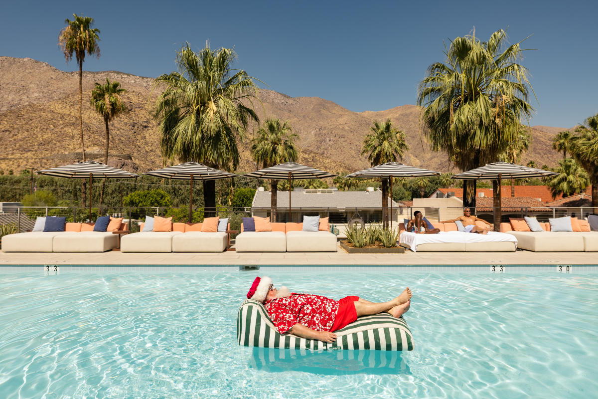 Playful holiday pool scene with mountain views in Palm Springs